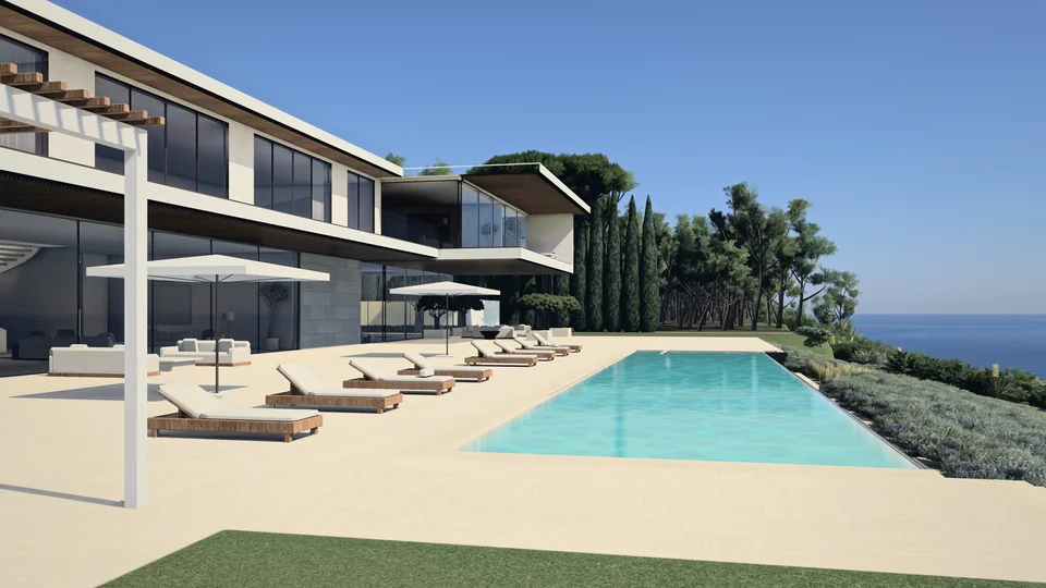MIRALL from its terrace: the white two-storey house above a long pool with loungers, cypresses and the sea to the side.
